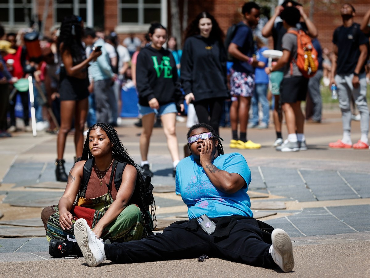 <strong>Onlookers watch the solar eclipse on Monday, April 8, 2024, at the University of Memphis.</strong> (Mark Weber/The Daily Memphian)