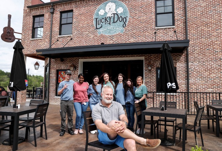 Owner James Losapio (front) and his staff host the Lucky Dog Music Hall &amp; Bar in Silo Square. (Mark Weber/The Daily Memphian)