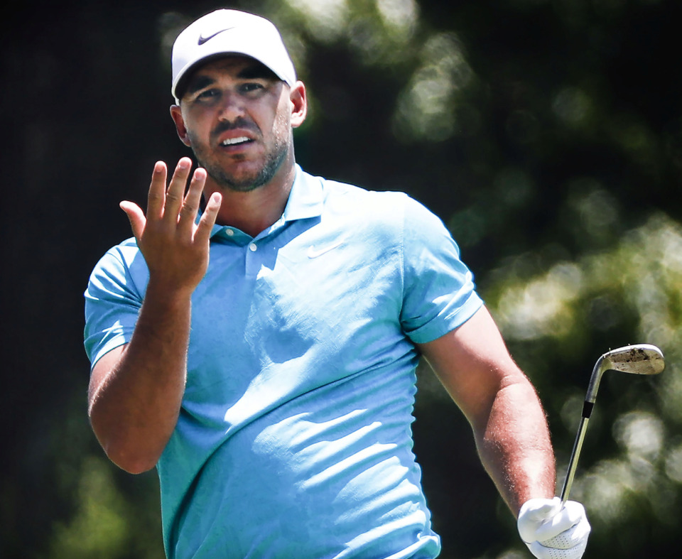 <strong>PGA golfer Brooks Koepka reacts after his fairway shot on the second hole during first-round action at the WGC-FedEx St. Jude Invitational at TPC Southwind, Thursday, July 25, 2019.</strong> (Mark Weber/Daily Memphian)