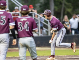 <strong>Collierville&rsquo;s Brody Winemiller celebrates after hitting a home run in the first inning of action with Houston High School April 3, 2023.</strong> (Greg Campbell/Special to The Daily Memphian)
