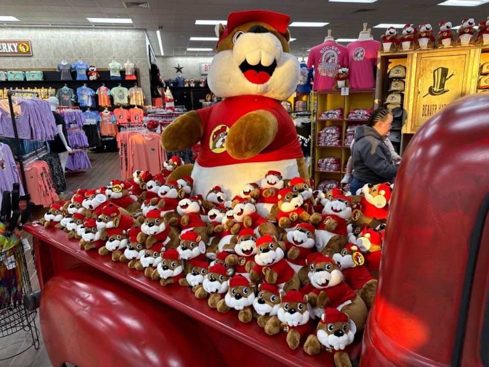 <strong>A shopper persues items near a display of Buc-ee's beaver dolls in the bed of a pickup truck inside the Buc-ees store early Thursday, April 4, 2024, in Johnstwon, Colo.</strong> (AP Photo/David Zalubowski)