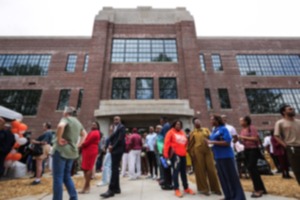<strong>Dozens of Memphians gather in front of the old Melrose High School building for the grand opening of the new Orange Mound Library April 26.</strong> (Patrick Lantrip/The Daily Memphian)
