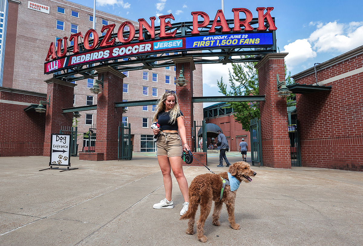 <strong>Alyson Hitz and her dog Rylo wait outside of AutoZone Park before Bark in the Park April 27.</strong> (Patrick Lantrip/The Daily Memphian)