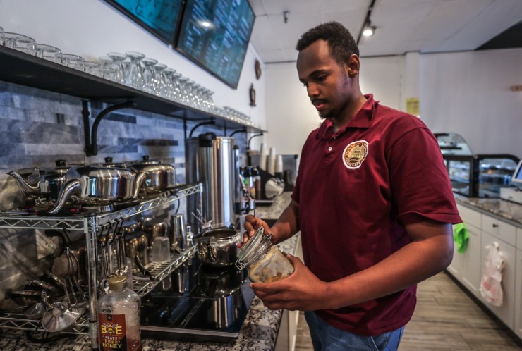 Mohammed Alshegaa makes a cup of ginger tea at Aldar Cafe in East Memphis on April 23, 2024. (Patrick Lantrip/The Daily Memphian)