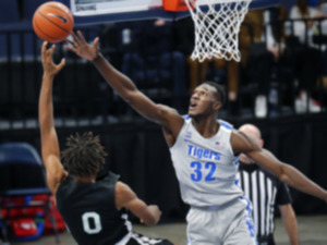 <strong>Memphis center Moussa Cisse (right) tries to block the shot of Mississippi Valley State guard Treylan Smith (left) during action on Tuesday, Dec. 8, 2020.</strong> (Mark Weber/The Daily Memphian file)