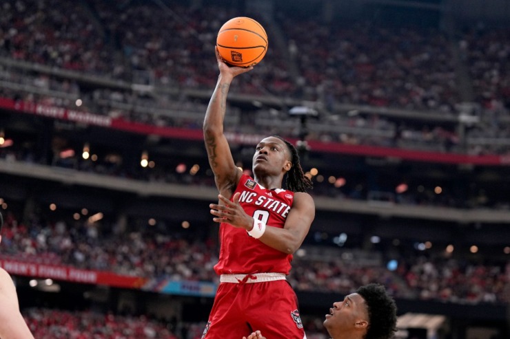 NC State guard DJ Horne shoots during the first half of the NCAA college basketball game against Purdue at the Final Four, Saturday, April 6, 2024, in Glendale, Ariz. (AP Photo/Brynn Anderson )