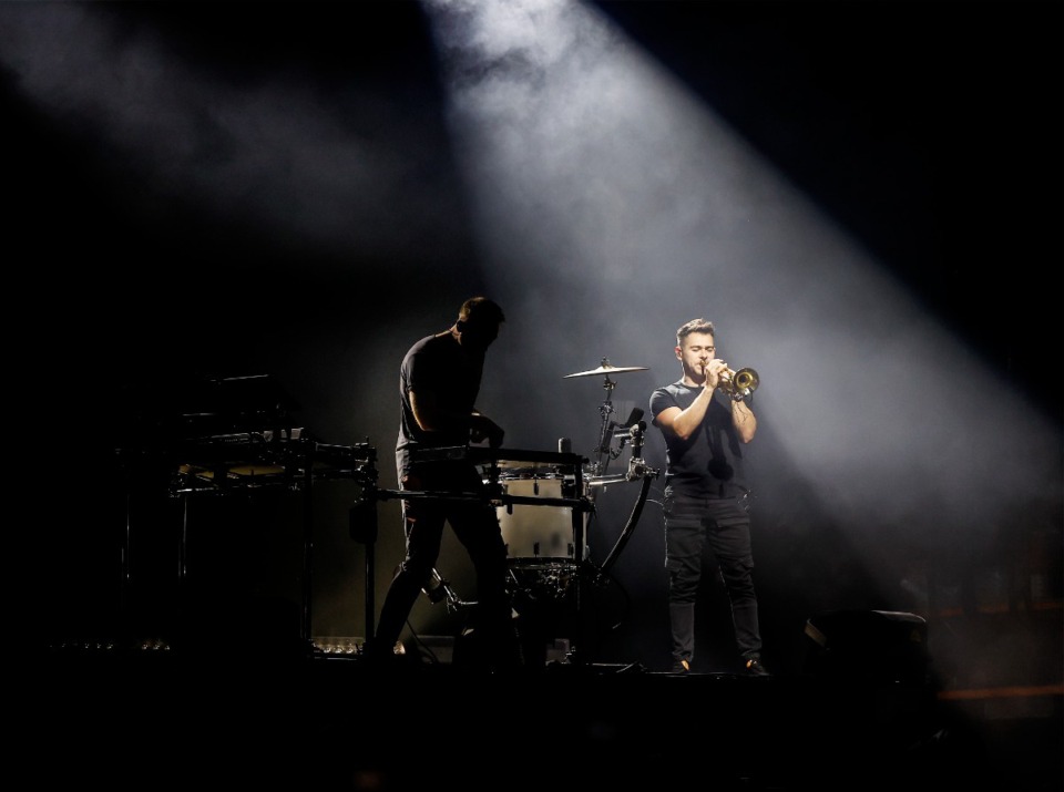 <strong>A single spotlight illuminates the Pacific Northwest electronic duo Odesza&nbsp; at Riverbeat.</strong> (Mark Weber/The Daily Memphian)