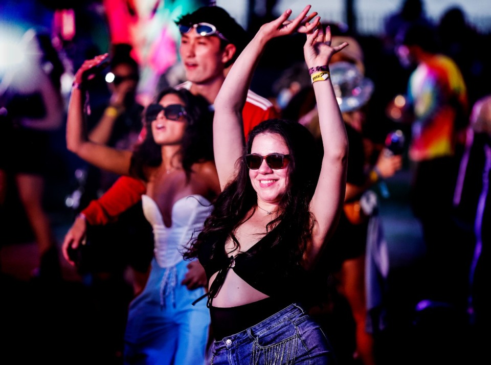 <strong>Music lovers, part of a notably young crowd at Riverbeat, dance at&nbsp; Whateverland, a tented DJ space augmented by a Ferris wheel and carousel.</strong> (Mark Weber/The Daily Memphian)