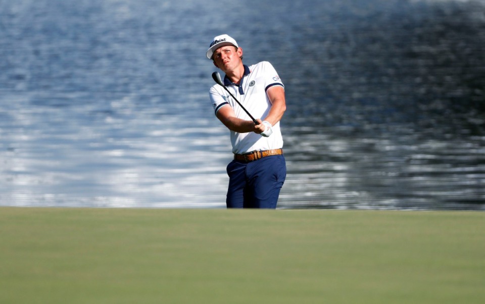 <strong>Cameron Smith chips onto the 18th green during the 2019 WGC-FedEx St. Jude Invitational. Smith finished Friday tied for second place at 7-under.</strong> (Houston Cofield/Special to The Daily Memphian)