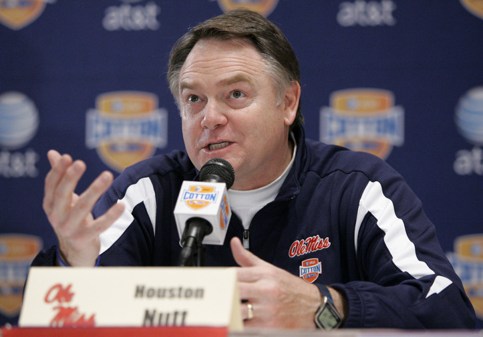 <strong>Mississippi coach Houston Nutt gestures as he responds to a question during a Cotton Bowl news conference in Irving, Texas, on Dec. 30, 2008.</strong> (Tony Gutierrez/AP Photo file)