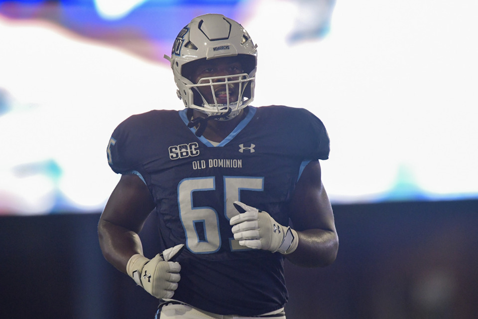 <strong>Old Dominion offensive lineman Chris Adams (65) runs down field during an NCAA football game on Saturday, Sept. 9, 2023 in Norfolk, Va</strong>. (Mike Caudill/AP Photo file)