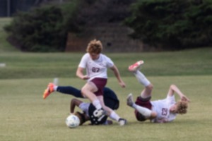 <strong>Players collide while going for the ball during Tuesday&rsquo;s game between Evangelical Christian School and Lausane at St. George's Independent School May 7.</strong> (Brad Vest/Special to The Daily Memphian)