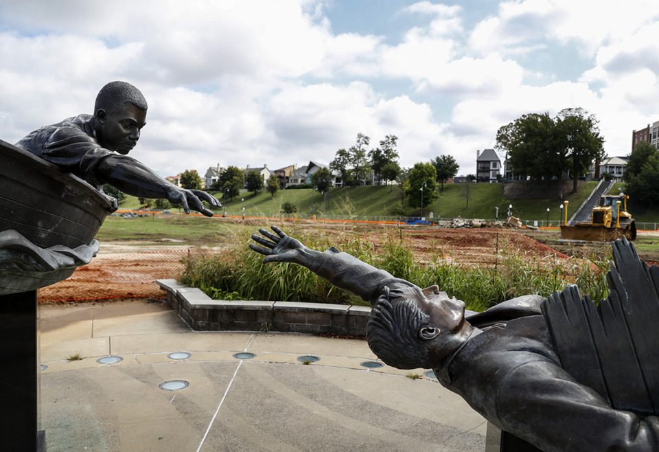 <strong>The existing statue of Tom Lee, surrounded by construction, on Oct. 6, 2021. Internationally acclaimed artist Theaster Gates created the centerpiece art for the redesigned Tom Lee Park.</strong> (Mark Weber/The Daily Memphian file)