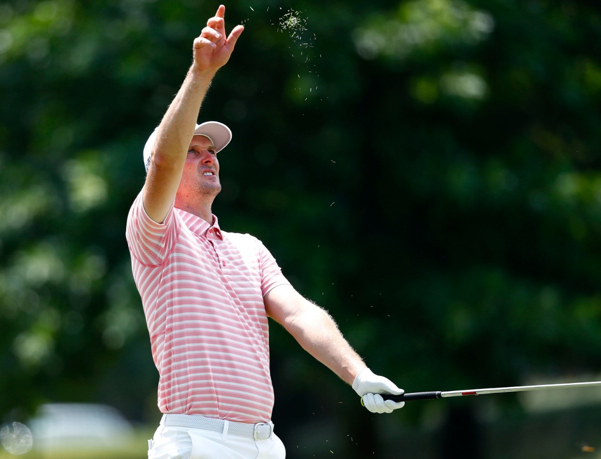 <strong>Justin Rose checks the wind direction before taking a swing on the ninth fairway during the 2019 WGC-FedEx St. Jude Invitational.</strong> (Houston Cofield/Special To The Daily Memphian)