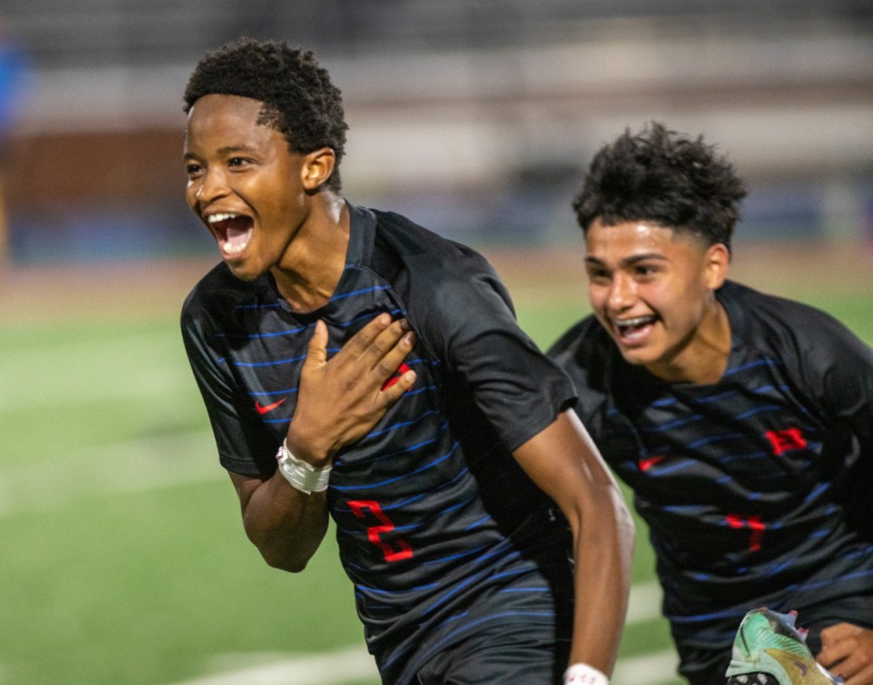 <strong>Mihezagiro Lewis reacts after scoring for Bartlett to take the lead in Thursday's district playoff match against Collierville at Bartlett High School.</strong> (Greg Campbell/Special to The Daily Memphian)