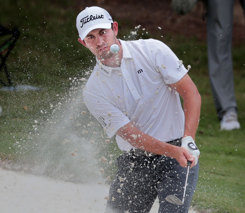 <strong>Patrick Cantlay blasts out of the sand on the 4th green during the third round of tournament play at the WGC-FedEx St. Jude Invitational at TPC Southwind on July 27, 2019.</strong> (Jim Weber/Daily Memphian)