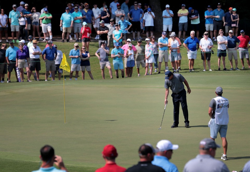 <strong>Phil Mickelson lines up his putt on the 7th green during the third round of tournament play at the WGC-FedEx St. Jude Invitational at TPC Southwind on July 27, 2019.</strong> (Jim Weber/Daily Memphian)
