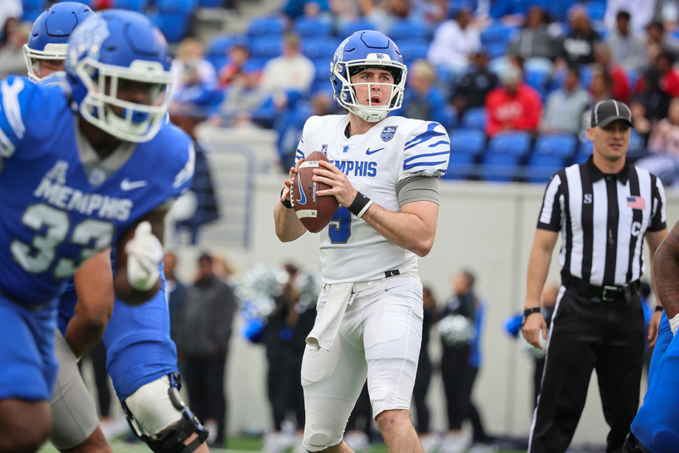 <strong>Memphis Tiger quarter back Seth Henigan (9) looks to pass the ball during the spring game at Simmons Bank Liberty Stadium.</strong> (Wes Hale/Special to The Daily Memphian)