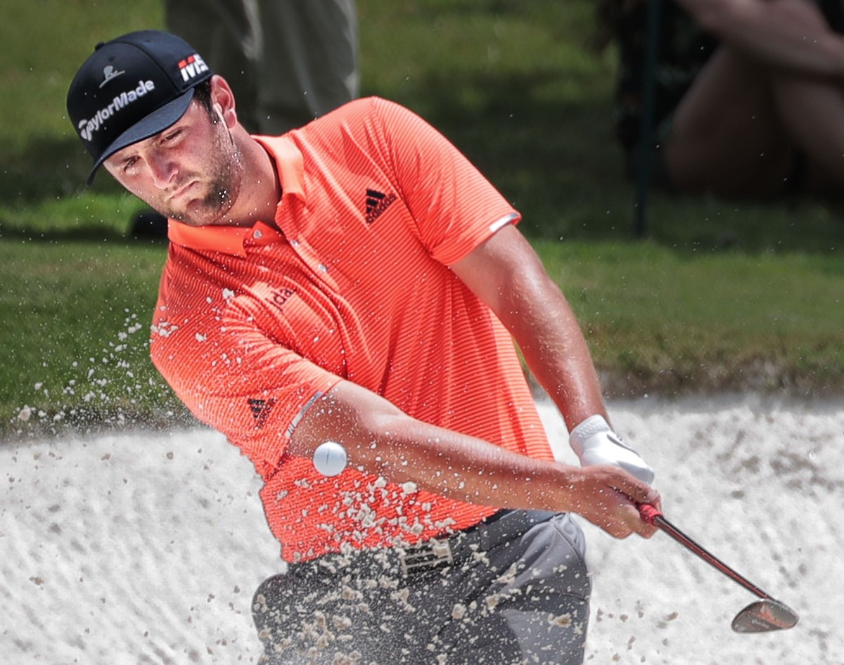 <strong>Jon Rahm fires out of the sand on the 4th green during the third round of tournament play at the WGC-FedEx St. Jude Invitational at TPC Southwind on July 27, 2019.</strong> (Jim Weber/Daily Memphian)