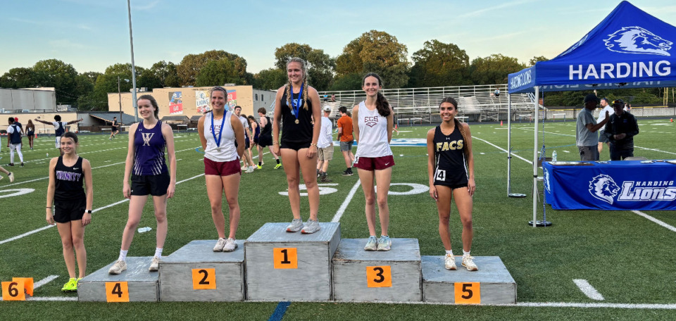 <strong>The top six finishers in the girls 800-meter race at the D2-A West Region championships at Harding Academy. USJ&rsquo;s Lilly Teague placed first, followed by Samantha Hardison and Meredith Porter of ECS. Lausanne&rsquo;s boys and the Harding girls won the D2-A region team titles.</strong> (David Boyd/The Daily Memphian)