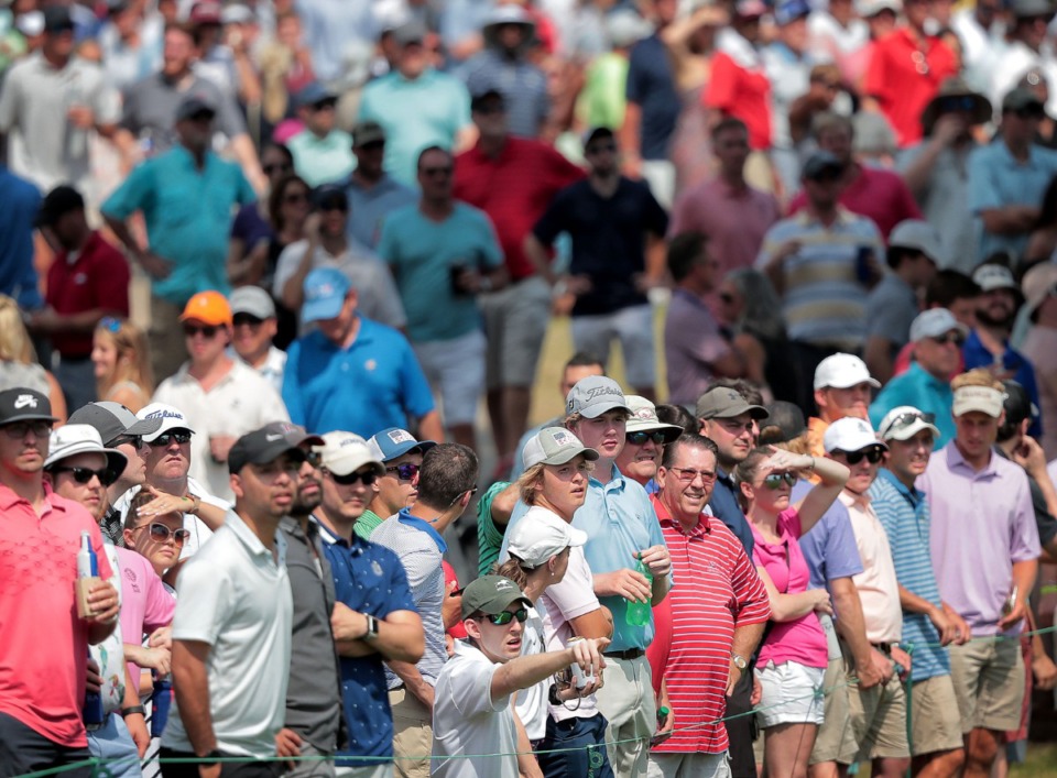 <strong>Fans watch as Brooks Koepka hits onto the 17th green during the third round of tournament play at the WGC-FedEx St. Jude Invitational at TPC Southwind on July 27, 2019. </strong>(Jim Weber/Daily Memphian)