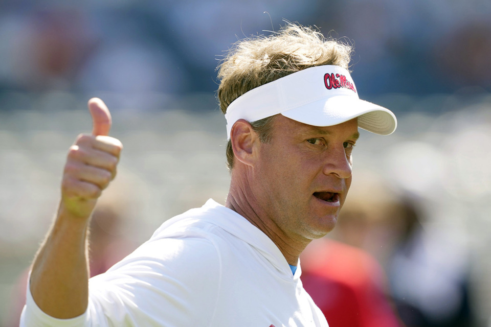 <strong>Mississippi coach Lane Kiffin shows his approval at his players efforts in a number of non-football events that were part of the the NCAA college football team's spring game, Saturday, April 13, 2024, in Oxford, Miss. The spring portal window in college football is closed. Kiffin lived up to the portal king moniker as the Rebels went all in.</strong> (Rogelio V. Solis/AP Photo file)
