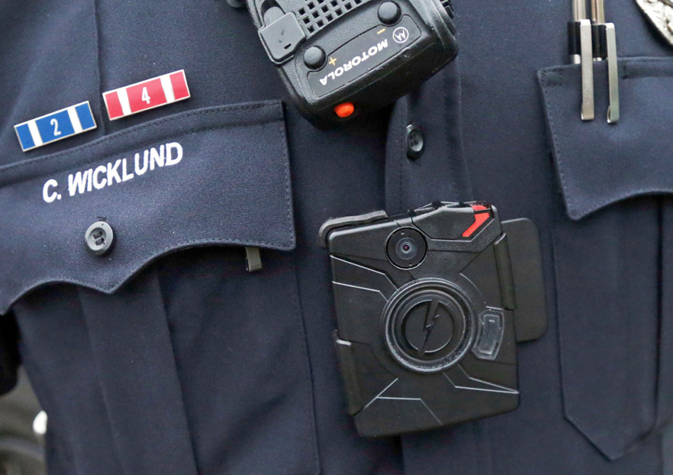 <strong>Body cameras, video storage and the capability that the cameras automatically start recording when an officer draws their weapon will cost the City of Memphis up to $54 million in debt over five years.</strong> (Jim Mone/AP Photo file)