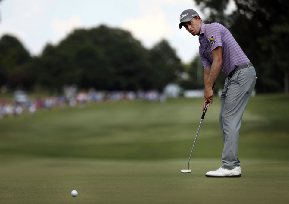<strong>Webb Simpson eyes a putt on the 17th green of the World Golf Championships in Memphis Sunday, July 28.</strong> (Patrick Lantrip/Daily Memphian)