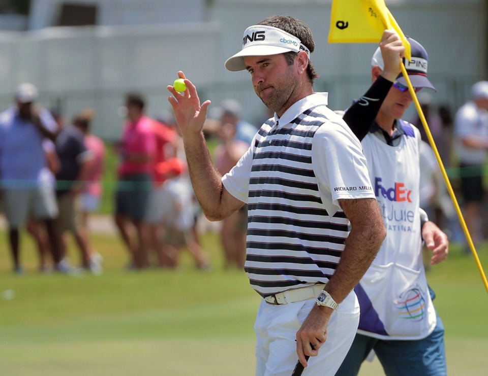 <strong>Bubba Watson acknowledges applause from the large gallery after sinking a putt on Sunday.</strong> (Patrick Lantrip/Daily Memphian)