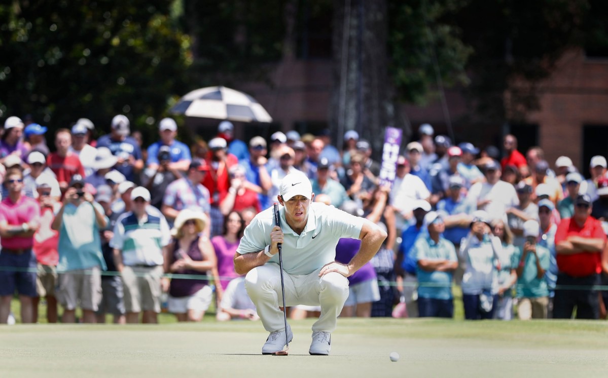 <strong>Rory McIlroy lines up a putt on the second hole Sunday during the final round.</strong> (Mark Weber/Daily Memphian).