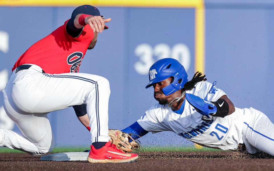 <strong>Memphis shortstop Daunte Stuart (20) slides into second base during an April 2, 2024 game against Ole Miss. Friday night Stuart&nbsp;drove in a pair of runs and finished the night 2-for-6 with a walk and a stolen base.</strong> (Patrick Lantrip/The Daily Memphian File)