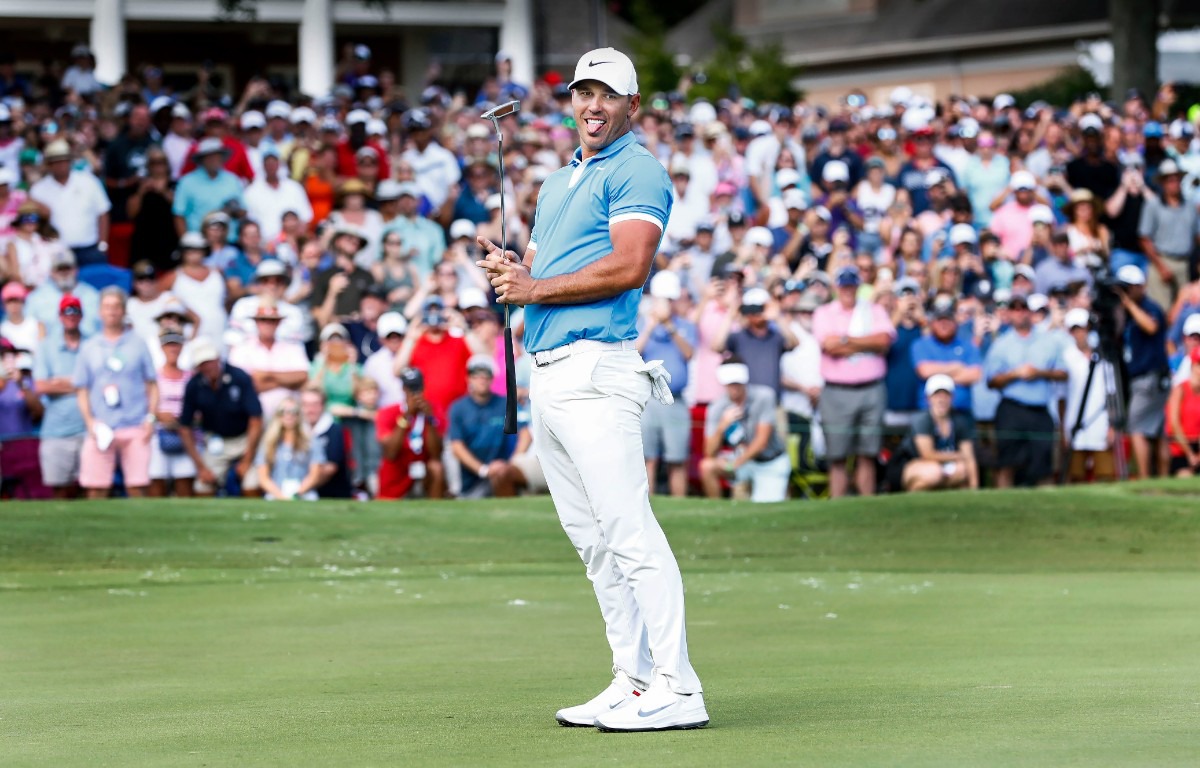 <strong>PGA golfer Brooks Koepka reacts after missing a birdie putt at hole 18, while on his way to winning the WGC-FedEx St. Jude Invitational at TPC Southwind, Sunday, July 28, 2019. Koepka, shot 16-under for the tournament and 5-under on the final day.</strong> (Mark Weber/Daily Memphian).