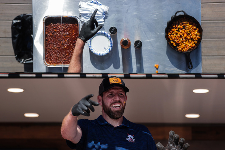 <strong>Jacob Lubbers leads a cooking demo for baked beans during the third day of the Memphis in May World Championship Barbecue Cooking Contest at Liberty Park May 17.</strong> (Patrick Lantrip/The Daily Memphian)