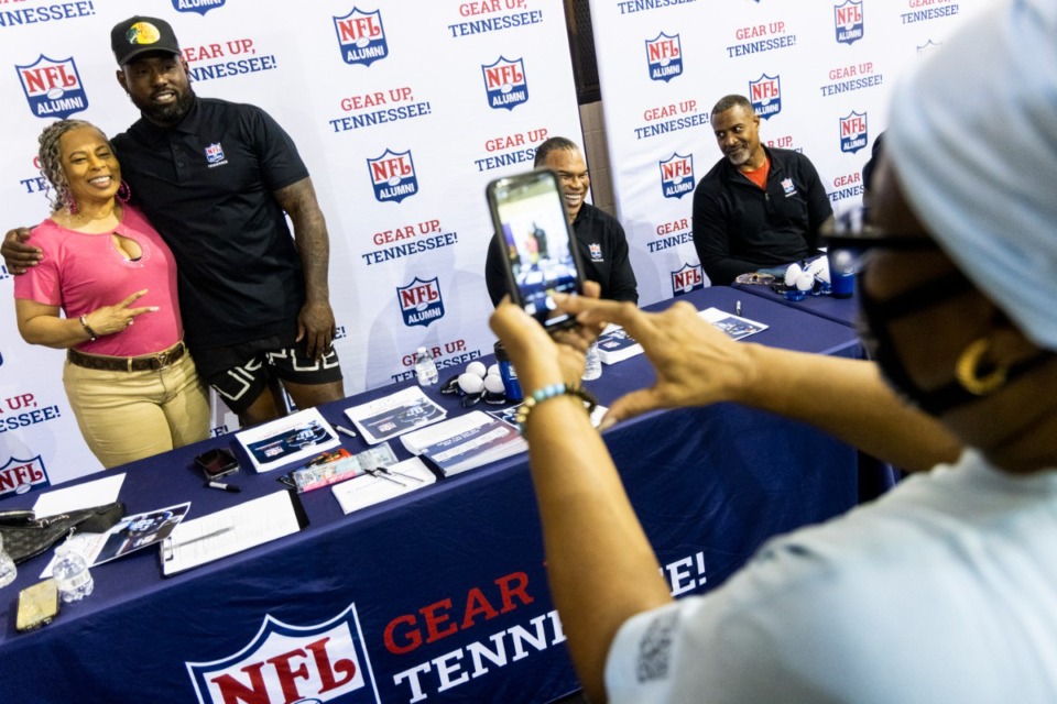 <strong>Allicia Cowan (left) poses for a photo with Delanie Walker, former Tennessee Titan, during a Health and Wellness Event at New Bethel Missionary Baptist Church with Meharry Medical College, TN CEAL, and the NFL Alumni Association.</strong> (Brad Vest/Special to The Daily Memphian)