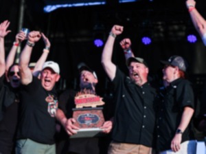 <strong>SmokeSlam Barbecue Festival contest grand champions, SmokeMasters BBQ, celebrate Saturday at Tom Lee Park. Pitmaster Will Hair said&nbsp;the team formed in 2007 and has been competing ever since.</strong> (Patrick Lantrip/The Daily Memphian)