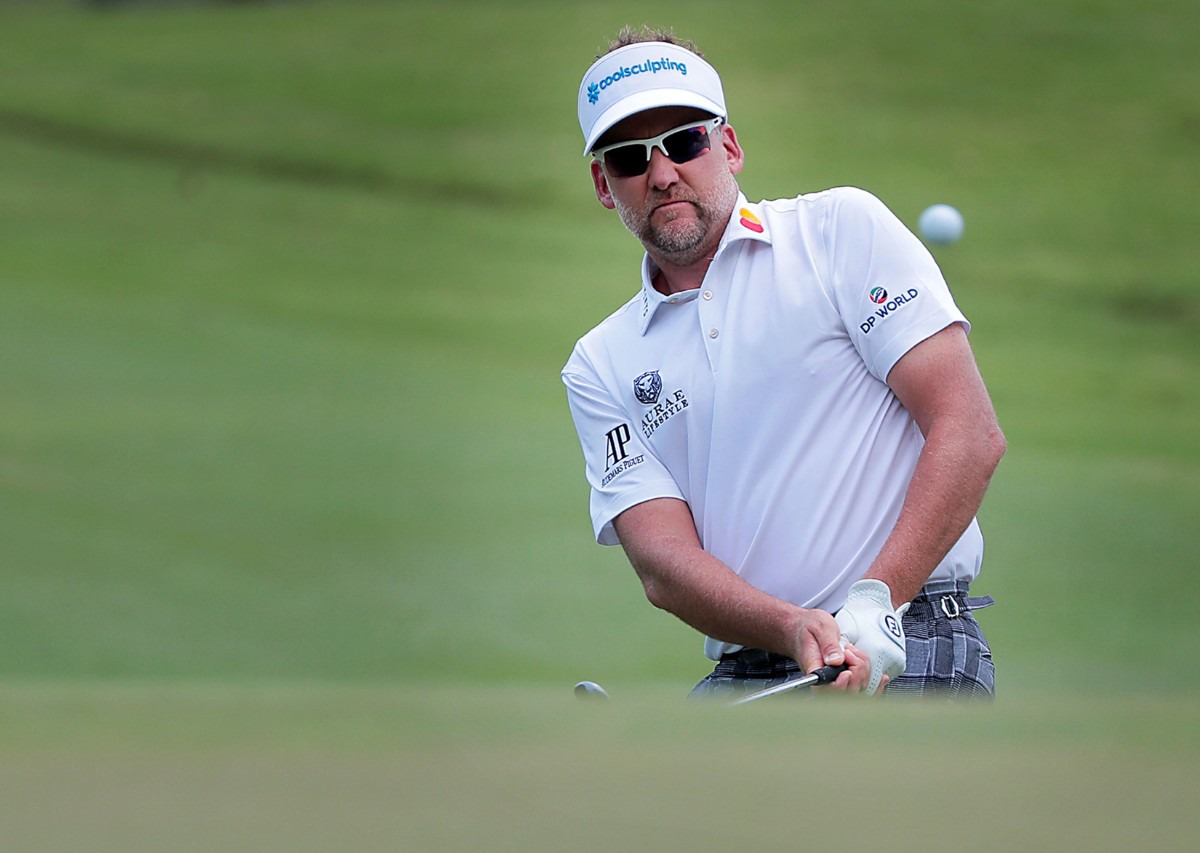 <strong>Ian Poulter chips a shot towards the green on the last day of the World Gold Championships in Memphis Sunday, July 28.</strong> (Patrick Lantrip/Daily Memphian)