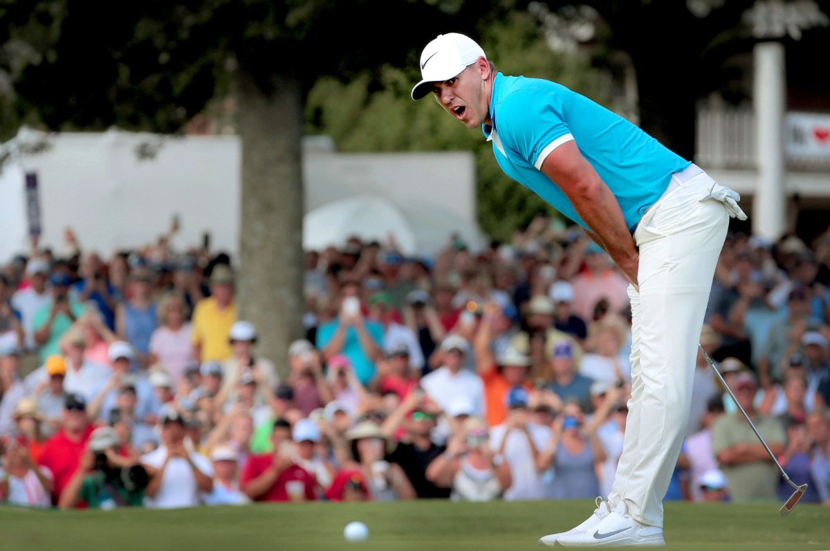 <strong>WGC champ Brooks Koepka reacts to missing his last putt on 18 even as the number one golfer in the world finishes 16-under.</strong> (Patrick Lantrip/Daily Memphian)