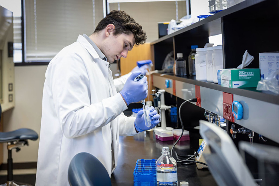 <strong>US Biologic process engineer Ian Johnson working in the company's Memphis Medical District lab.</strong> (Courtesy Jason Vales)