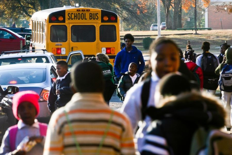 <strong>Students gather outside a school that's part of the state-run Achievement School District in Memphis.</strong> (Kyle Kurlick for Chalkbeat)