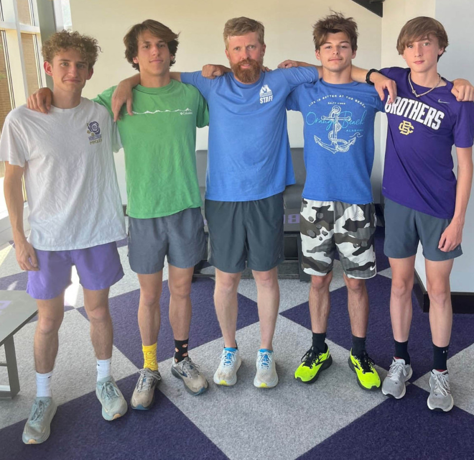 <strong>The CBHS team of (from left) Kaleb Smith, Joe Edwards, coach Nick Dwyer, Chaz Jones and Noah Mullenix took the 4 x 800 title.</strong> (John Varlas/The Daily Memphian file)