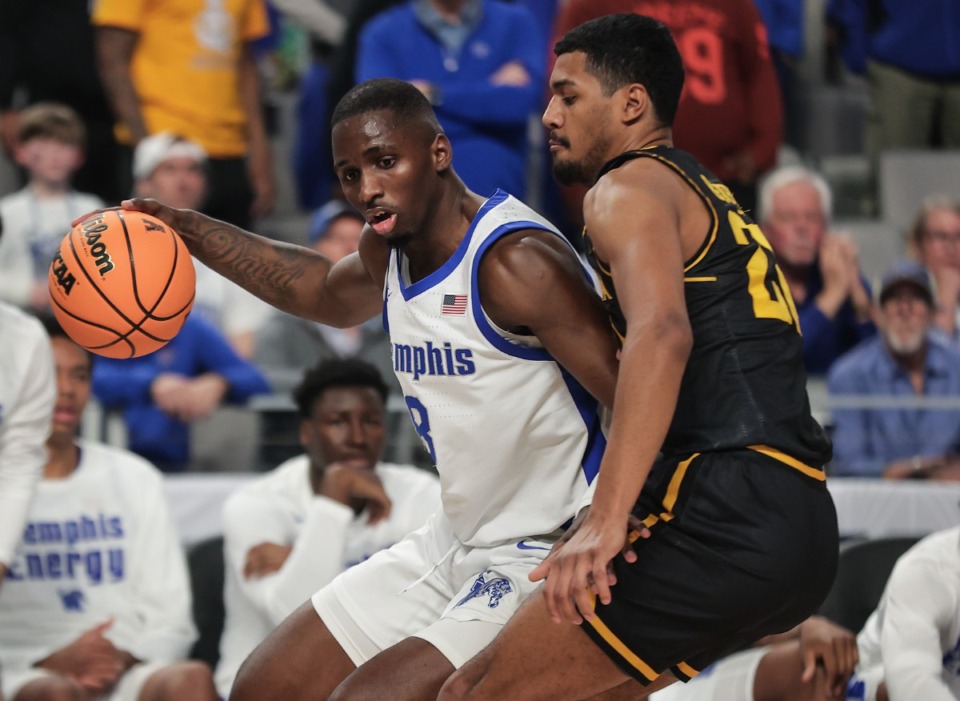 <strong>University of Memphis forward David Jones (8) posts up his defender during a March 14, 2024, game against Wichita State in Ft. Worth, Texas.</strong> (Patrick Lantrip/The Daily Memphian file)