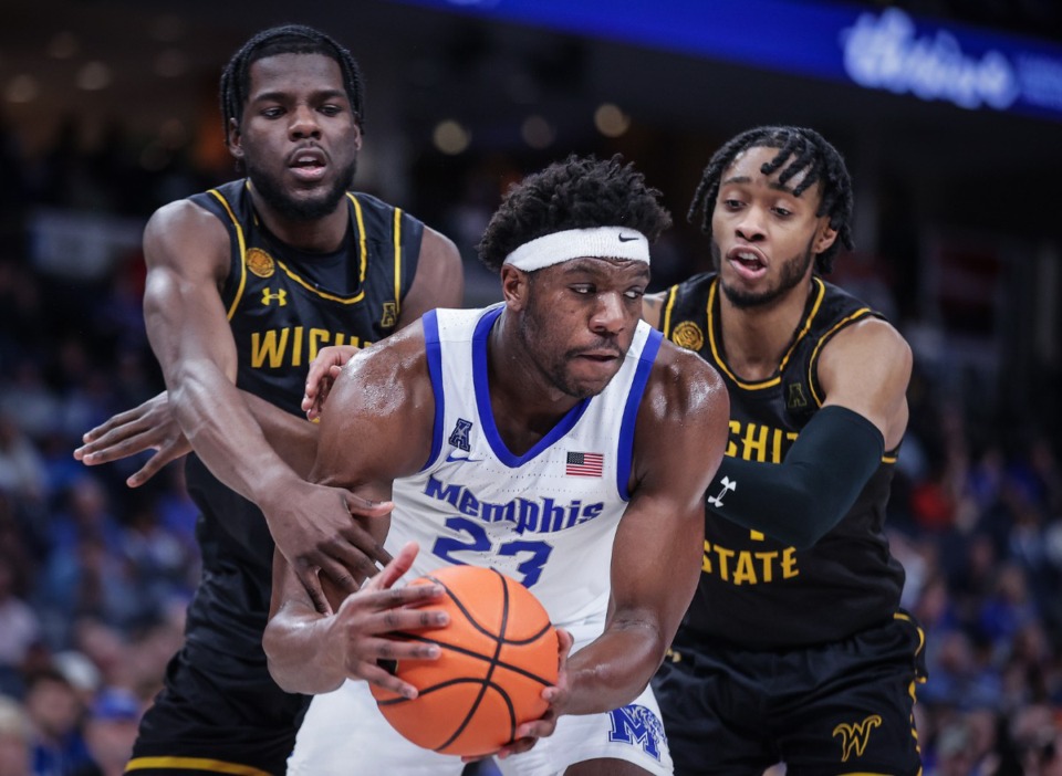 <strong>University of Memphis forward Malcolm Dandridge (23) battles two defenders during a Feb. 3, 2024 game against Wichita State.</strong> (Patrick Lantrip/The Daily Memphian file)