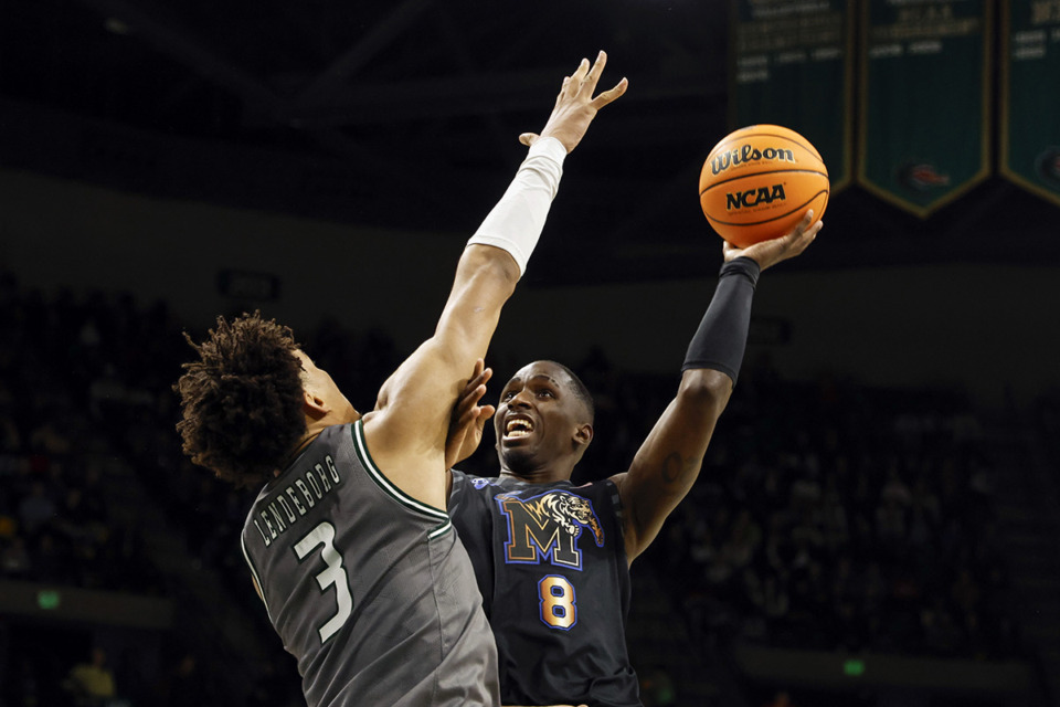 <strong>David Jones (8) shoots as UAB forward Yaxel Lendeborg (3) defends during the second half of an NCAA college basketball game Jan. 28 in Birmingham, Ala.</strong> (Butch Dill/AP file)