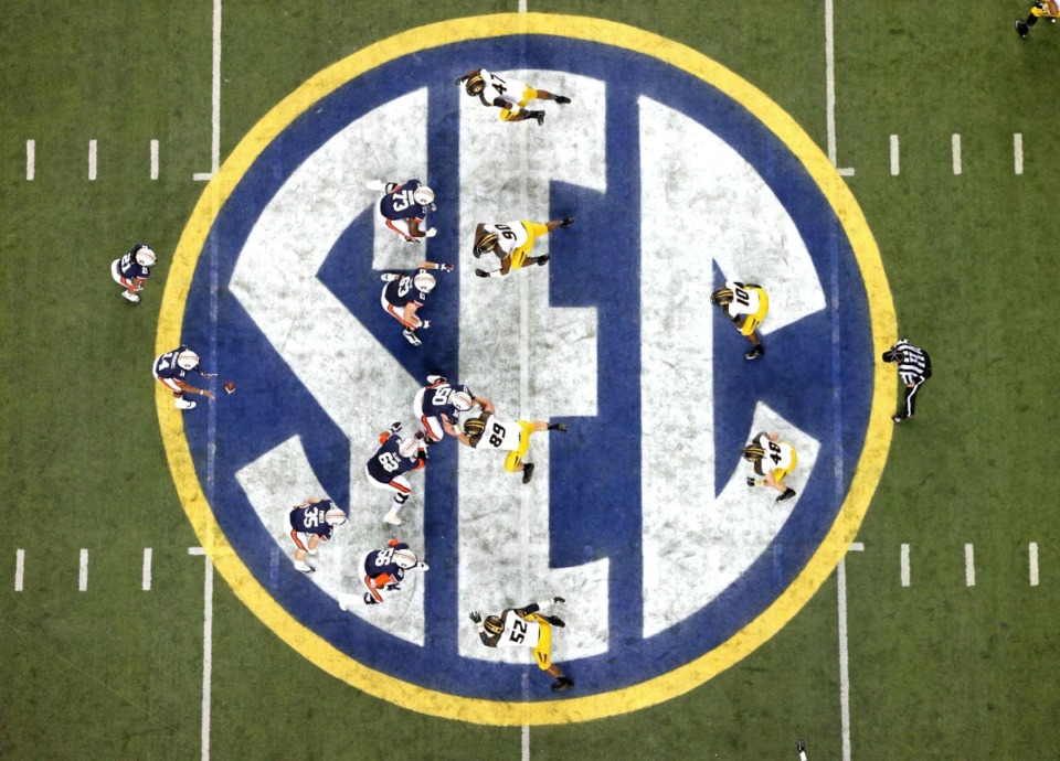 <strong>The debate within the SEC on how many league games to play is on hold.</strong> (Atlanta Journal-Constitution, Jason Getz,/AP file)