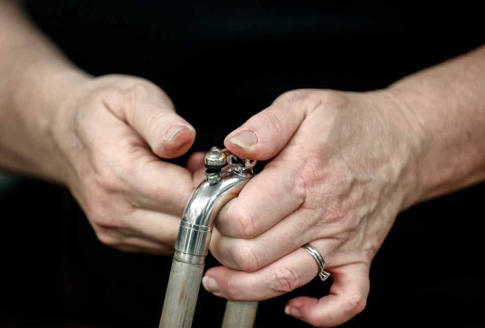 <strong>Navy band repair technician Noreen Garza takes apart a Euphonium wind instrument on Wednesday, May 22, 2024 at the Millington Naval Base.</strong> (Mark Weber/The Daily Memphian)