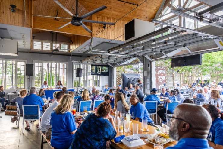 <strong>Fans look on as University of Memphis head women's basketball coach Alex Simmons, talks during the second Tiger Tour at Brookhaven Pub &amp; Grill Thursday, May 30, 2024.</strong> (Benjamin Naylor/The Daily Memphian)