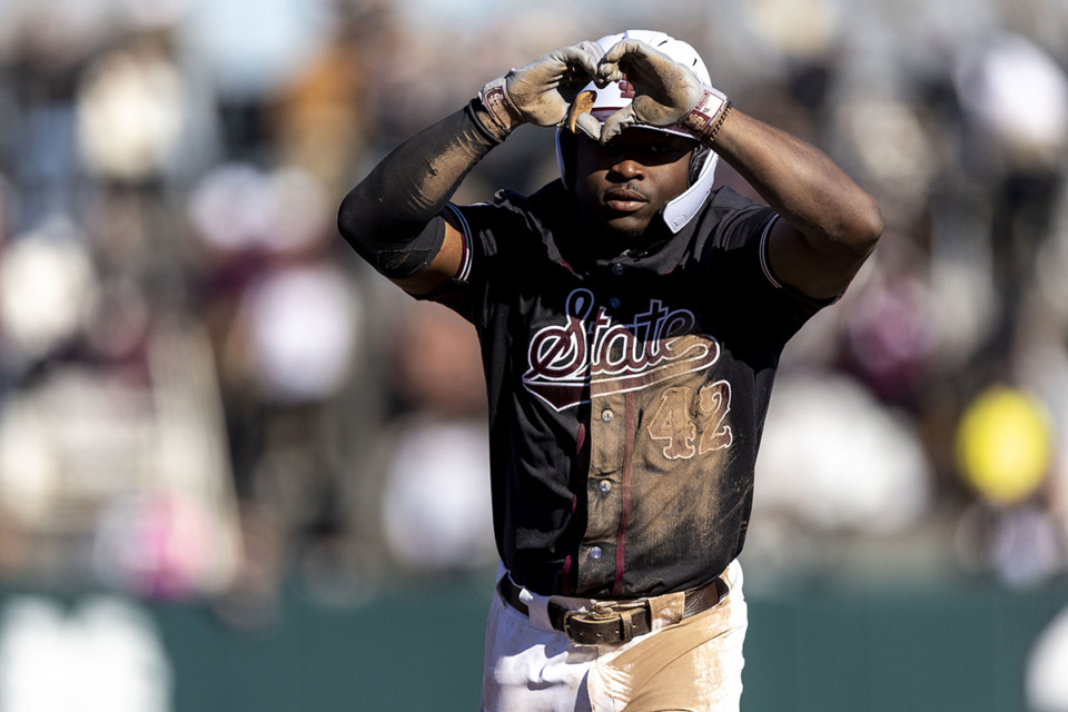 <strong>Mississippi State outfielder Dakota Jordan (42) hit a three-run home run in the 10th inning to give the Bulldogs a win in their NCAA Tournament opener Friday in Charlottesville, Va. (Vasha Hunt/AP file)</strong>