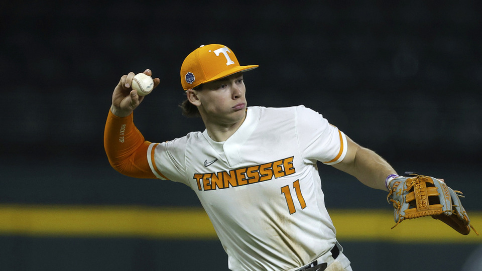 <strong>Tennessee infielder Billy Amick (11)&nbsp;hit a grand slam home run in the third.</strong> (Brandon Wade/AP file)