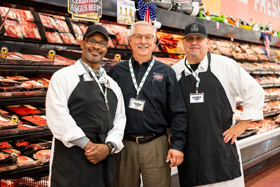 <strong>Store manager Gary Jenkins (middle), poses with meat manager LaRue Smith (left) and assistant meat manager Yves Soucy (right) as Superlo Foods celebrate the store&rsquo;s 80th anniversary.</strong> (Benjamin Naylor/The Daily Memphian)