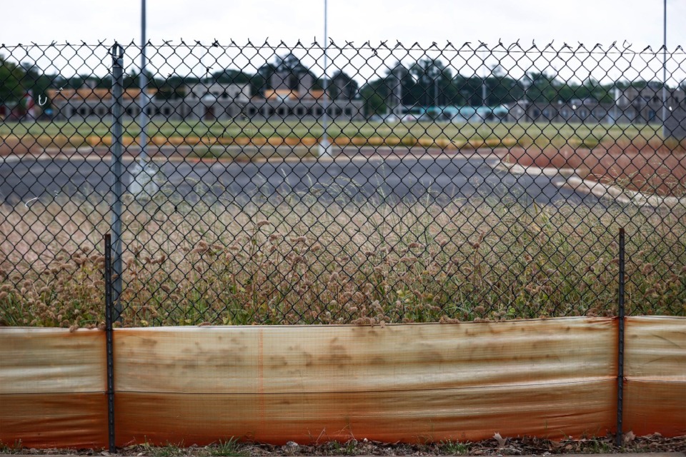 <strong>Overgrowth on the private development at the corner of Central Avenue and Early Maxwell Boulevard at Liberty Park on Monday, April 29, 2024.</strong> (Mark Weber/The Daily Memphian)